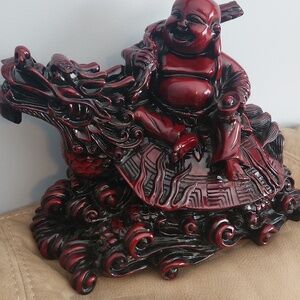 Laffing Buddha Riding A Dragon